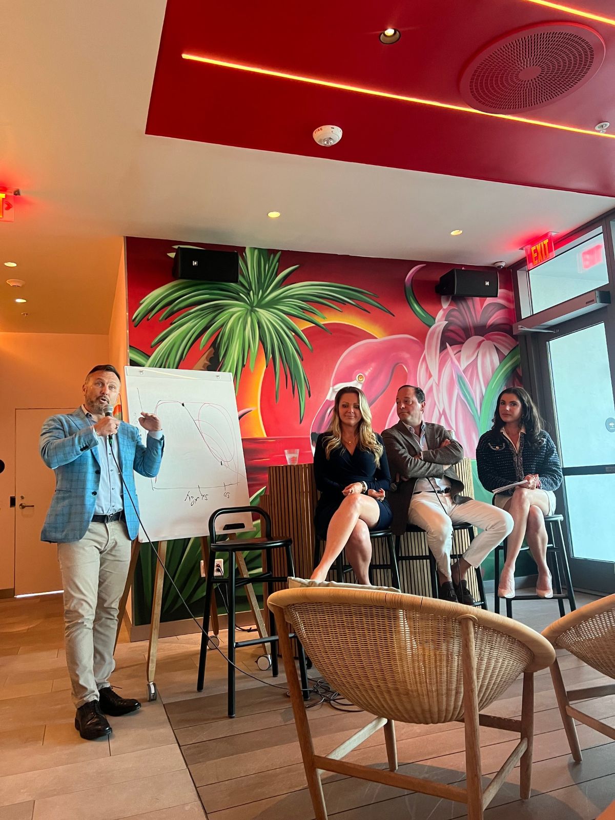Dr. Allan Stewart speaking at a panel event