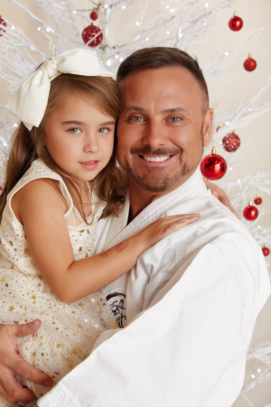 Dr. Allan Stewart with his daughter at the holidays